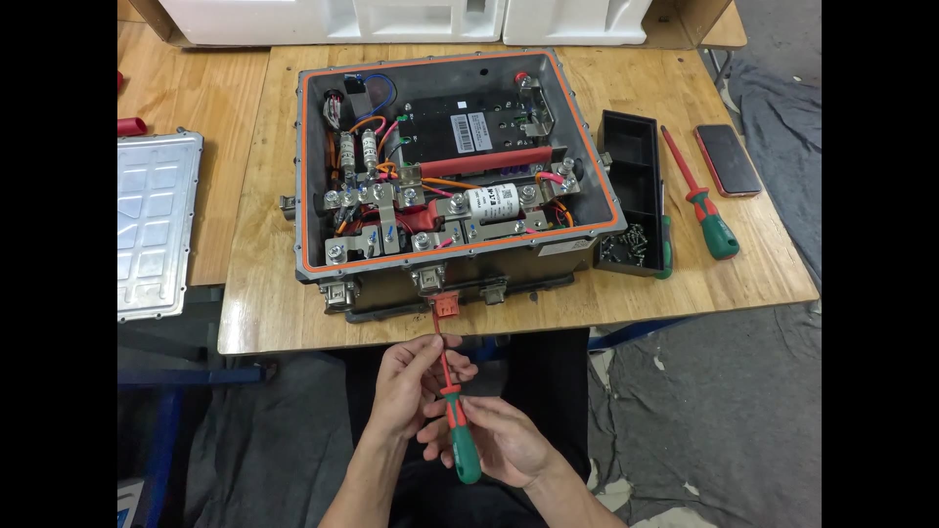 Still from a Removing - Installing BMS Box recording — Disassemble and reassemble the Battery Management System enclosure
