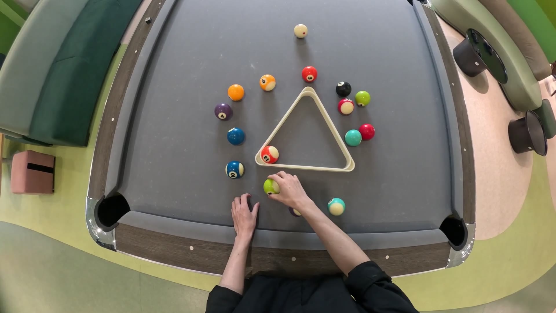 Still from a Rack the balls recording — Setting up billiard balls in the rack